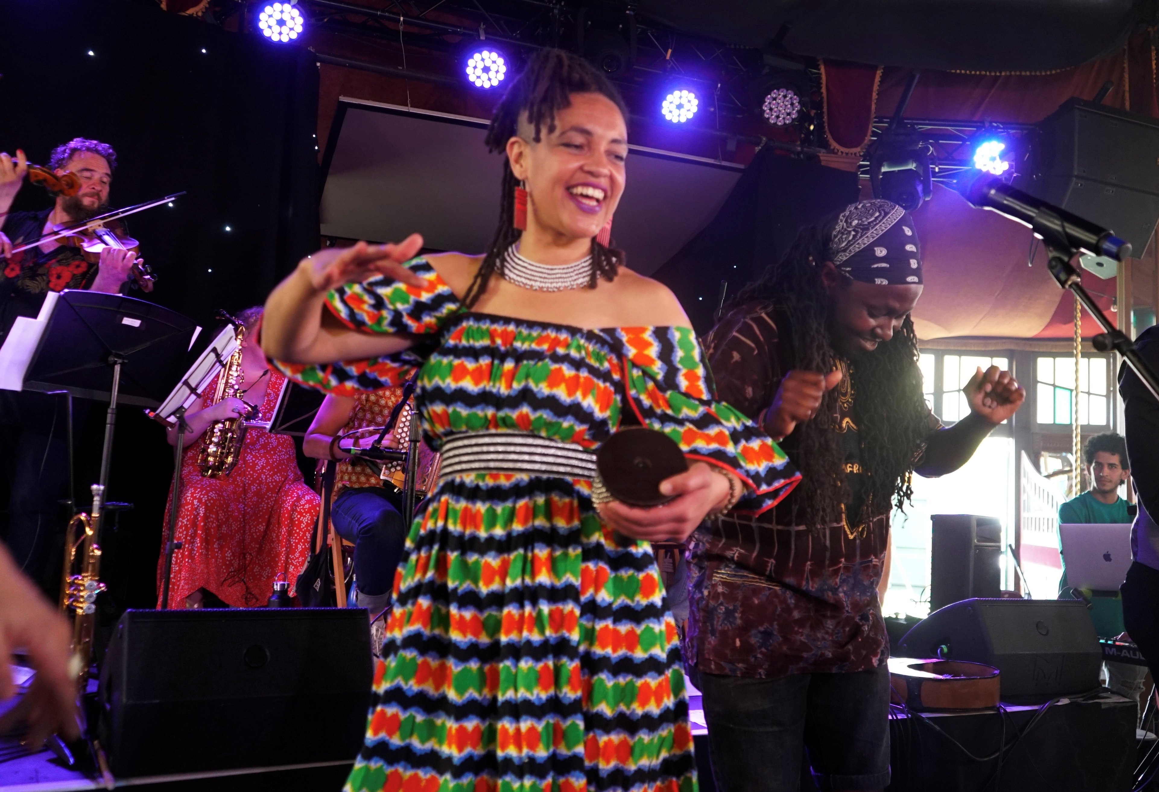 Image representing Players of One World Orchestra - Players of diverse musical traditions playing in the beautiful Charlton Church from The Astor Theatre